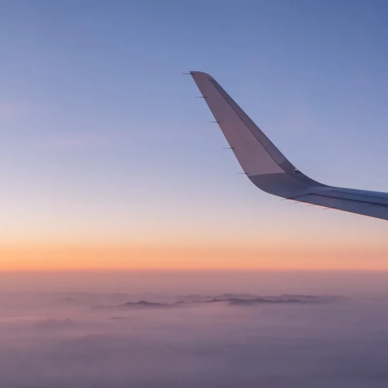 Airplane Wing in the Sky Photo for Aviation Service