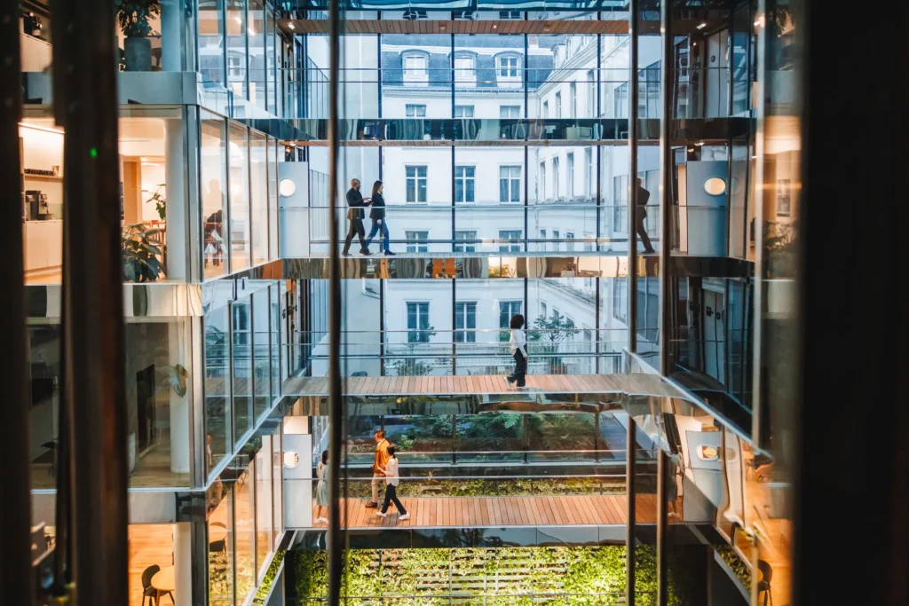 Modern office building with people passing by photo for Labor & Employment Service